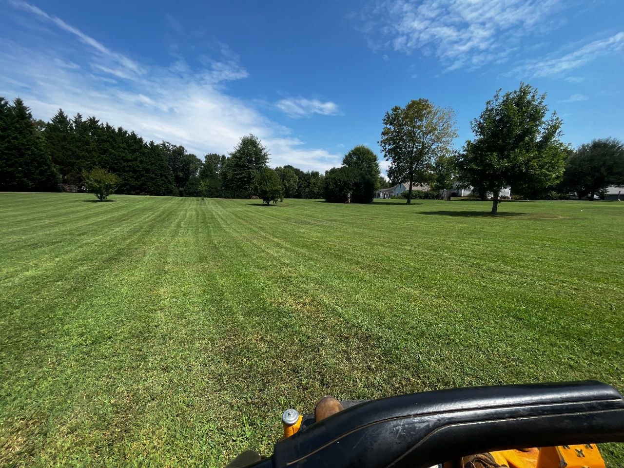 Vast green lawn with professional striping — Redwood Landscaping lawn care Simpsonville SC